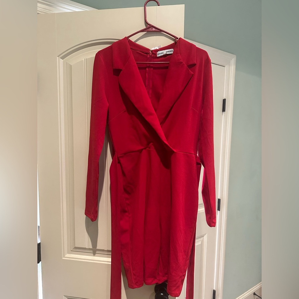 Red long sleeve romper with belt. size Large. Brand New